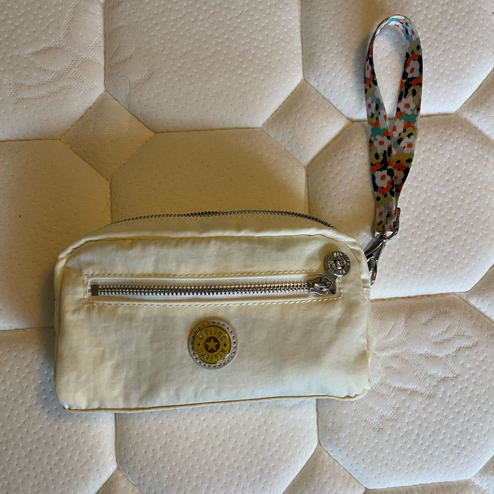 Kipling Cream Clutch Wristlet with Metallic Accents